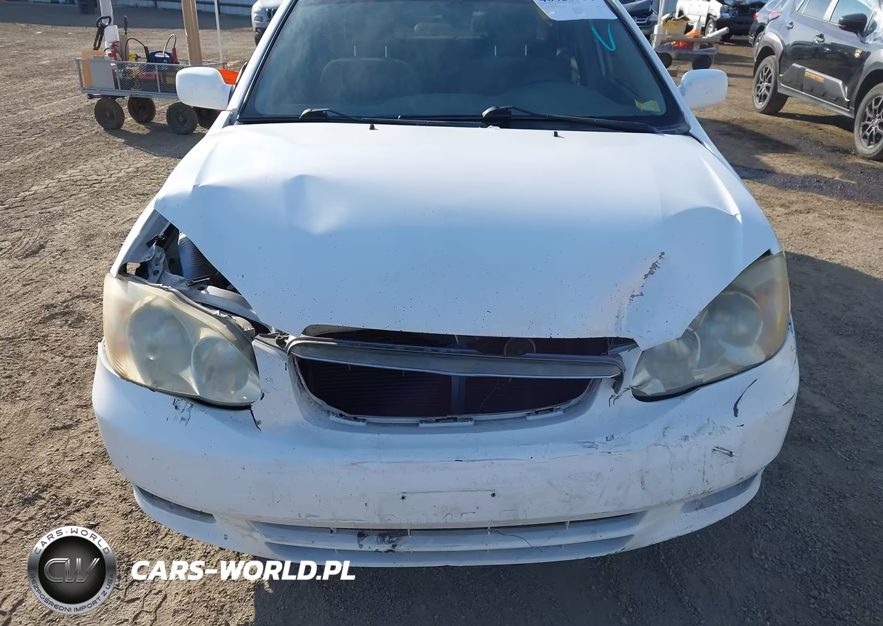 2003 Toyota Corolla Le VIN:JTDBR32E330044927 - 6