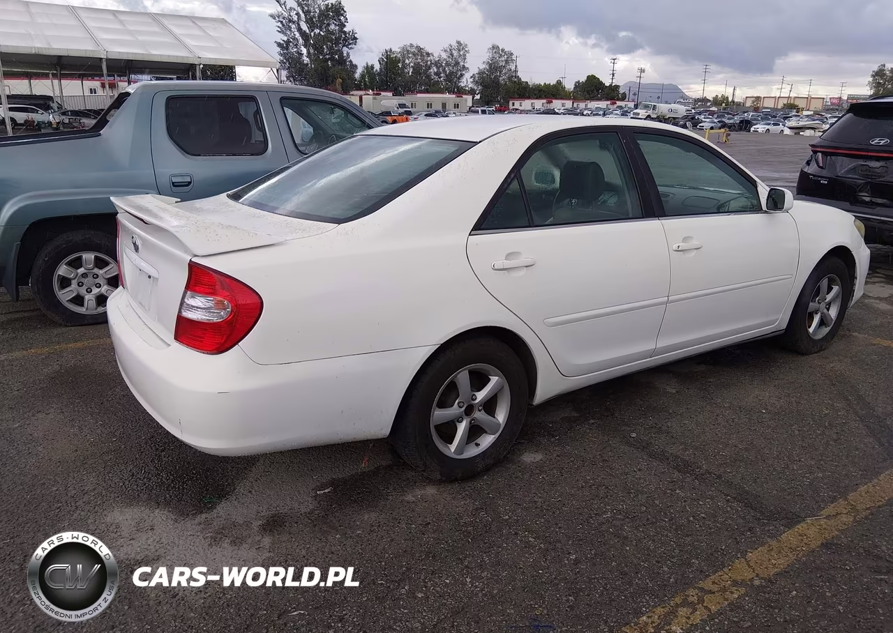 2004 Toyota Camry Se VIN:JTDBE32K940270568 - 4