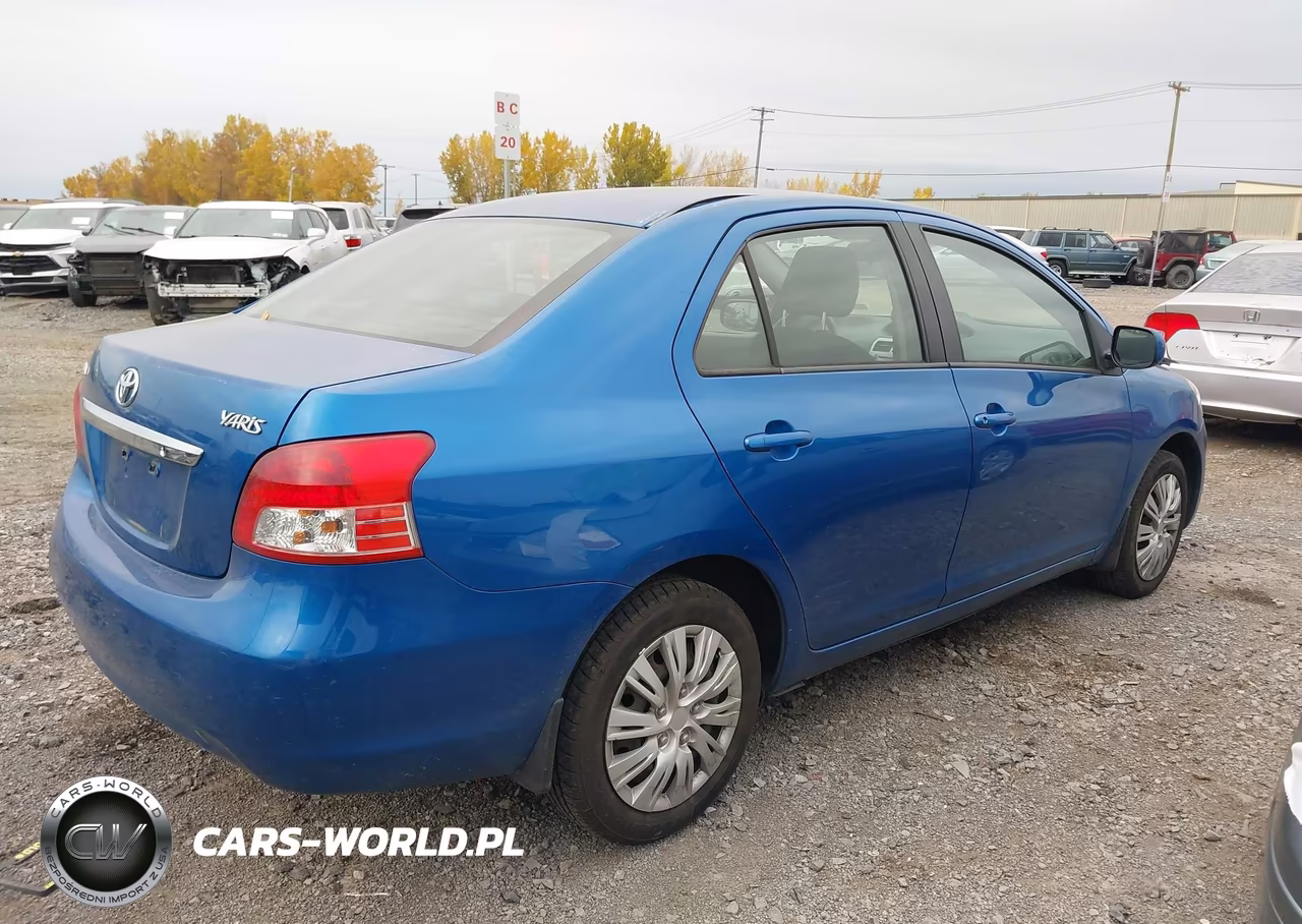 2009 Toyota Yaris VIN:JTDBT903391320936 - 4