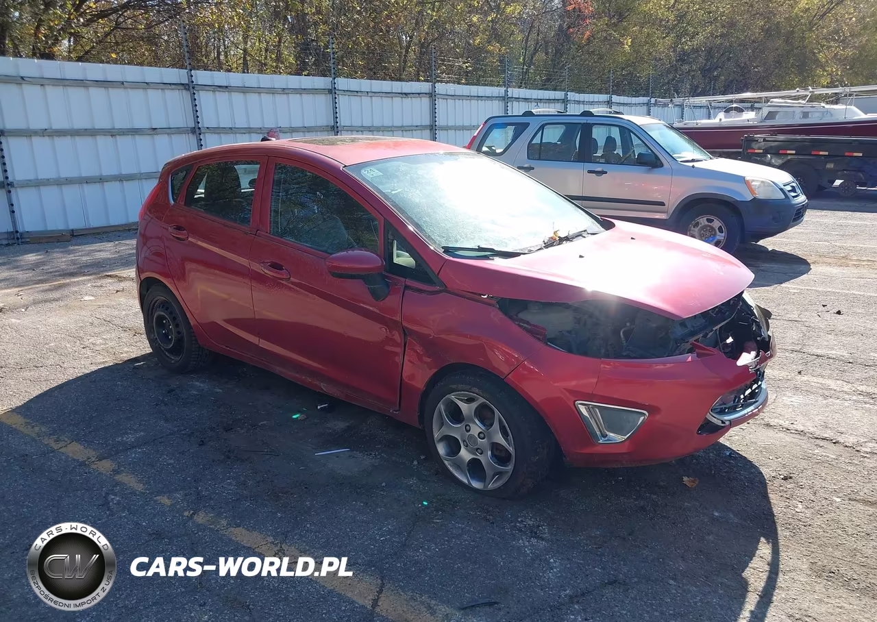 2011 Ford Fiesta Ses VIN:3FADP4FJXBM128398 - 1