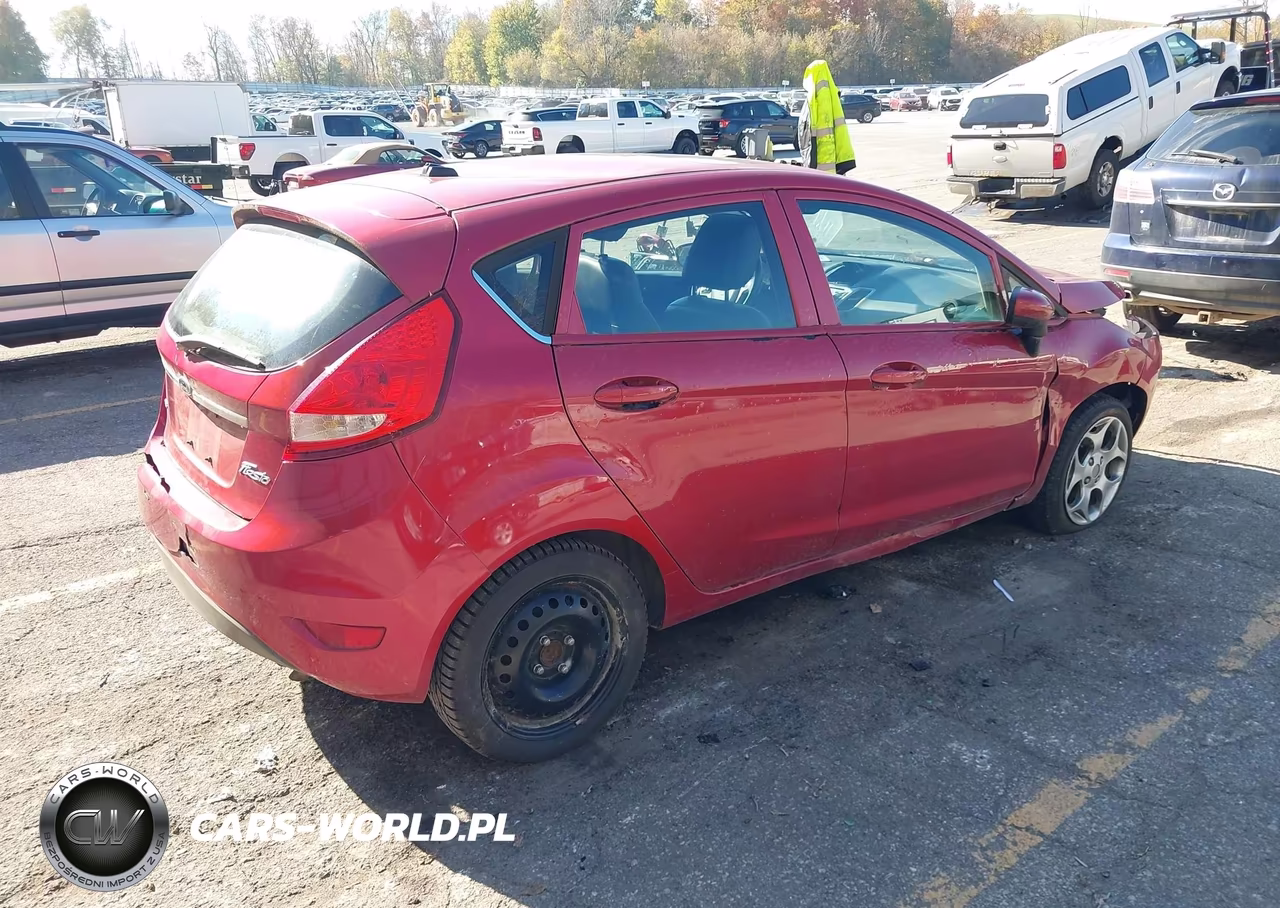 2011 Ford Fiesta Ses VIN:3FADP4FJXBM128398 - 4