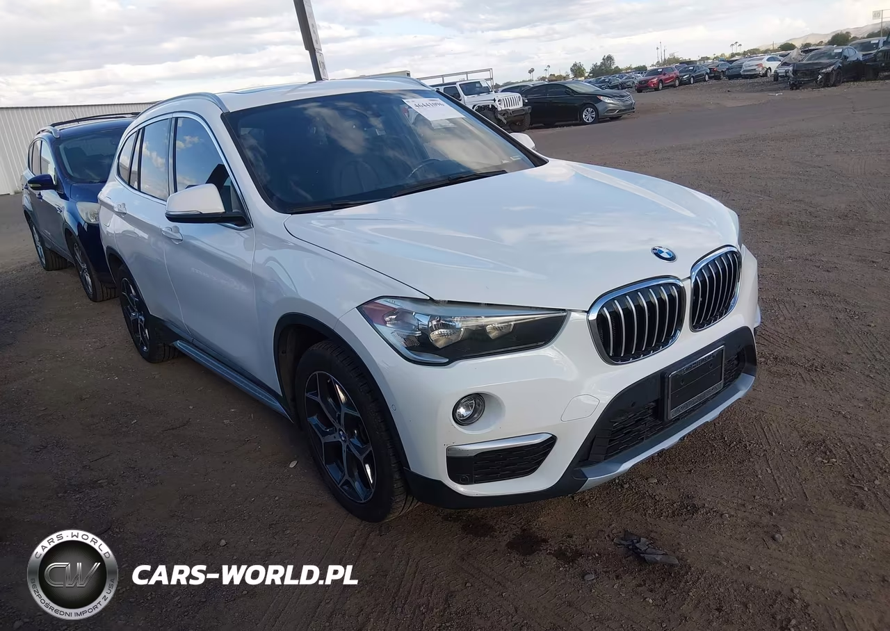 2018 BMW X1 xDrive28I VIN:WBXHT3C31J5L33963 - 1