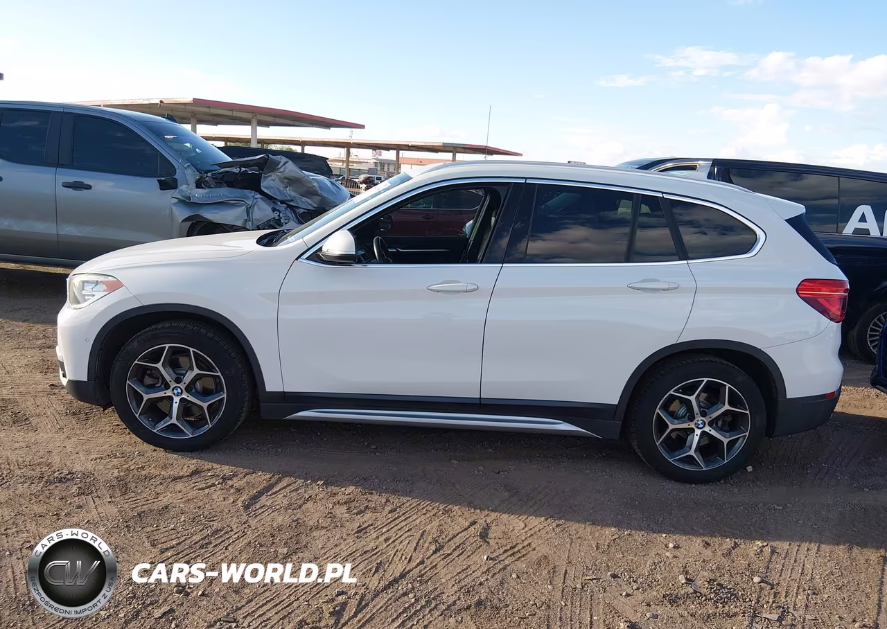 2018 BMW X1 xDrive28I VIN:WBXHT3C31J5L33963 - 13
