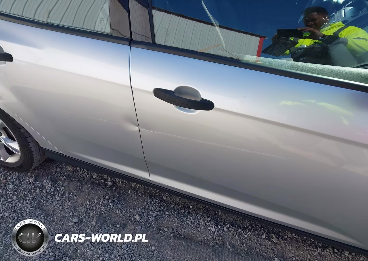 2015 Ford Focus S VIN:1FADP3E23FL247597 - 12