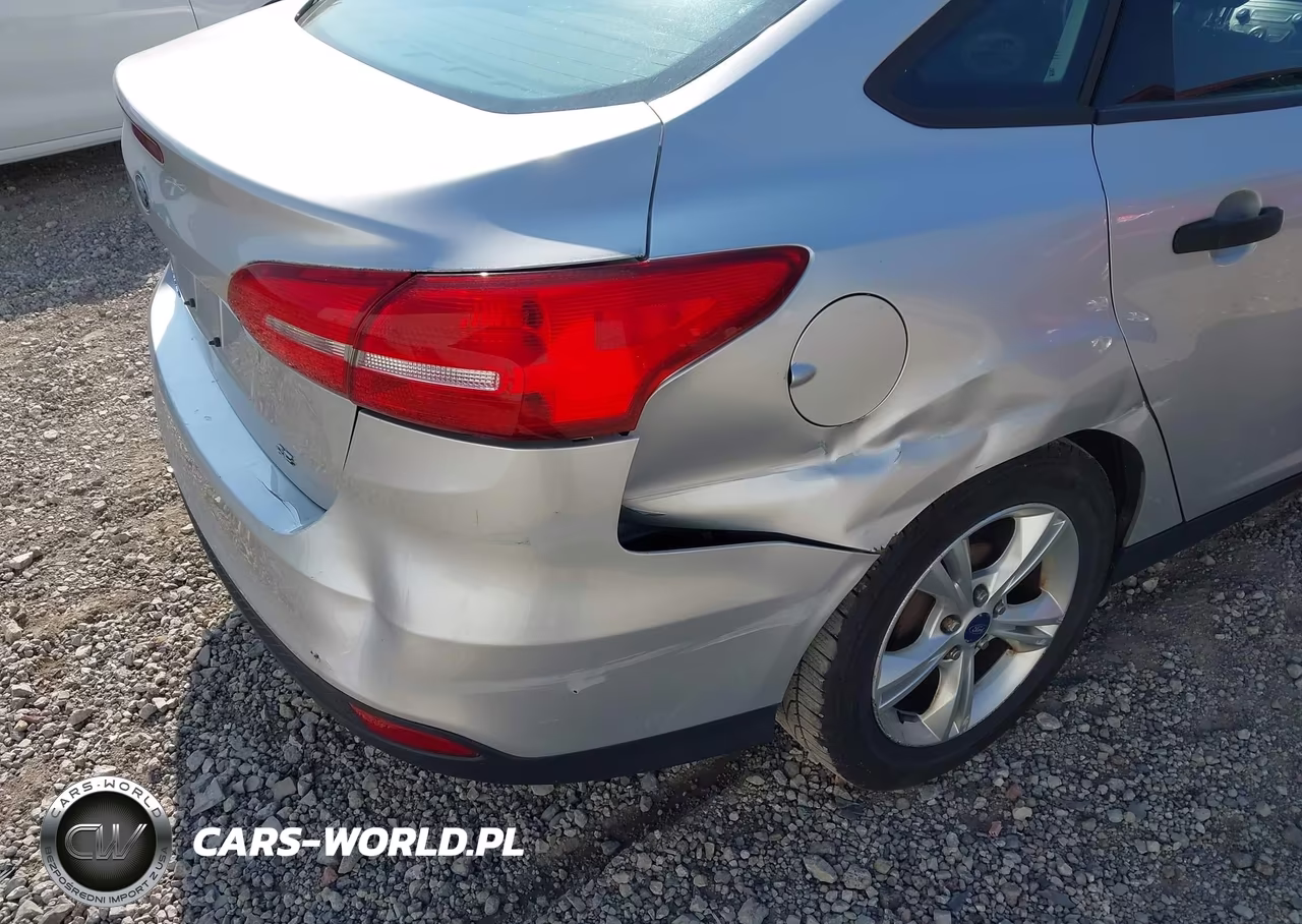2015 Ford Focus S VIN:1FADP3E23FL247597 - 13
