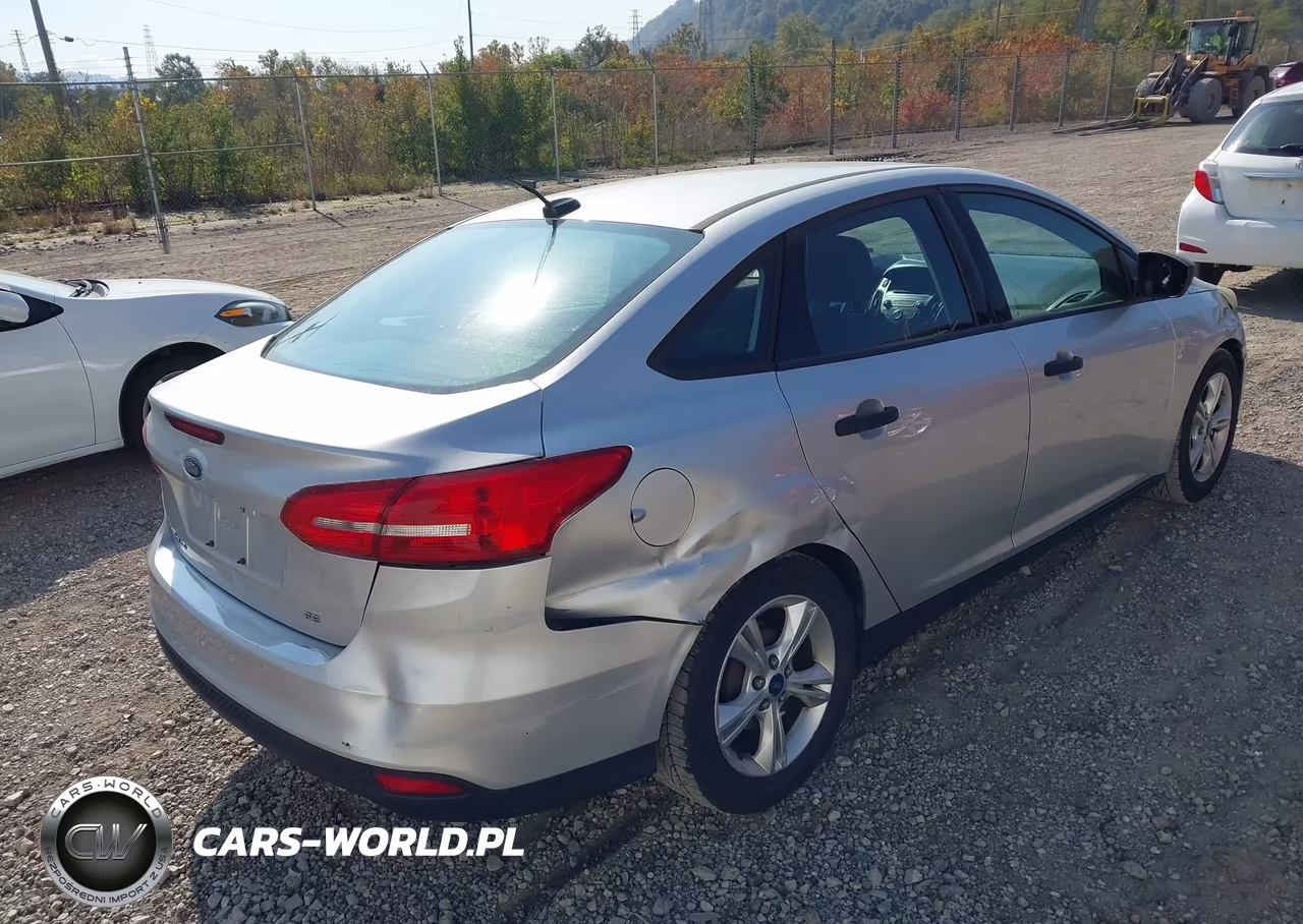 2015 Ford Focus S VIN:1FADP3E23FL247597 - 4