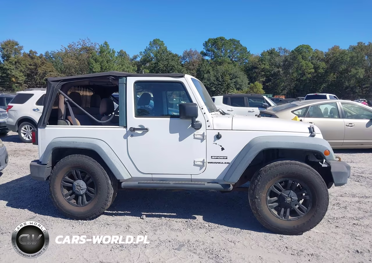 2011 Jeep Wrangler Sport VIN:1J4AA2D13BL536811 - 13
