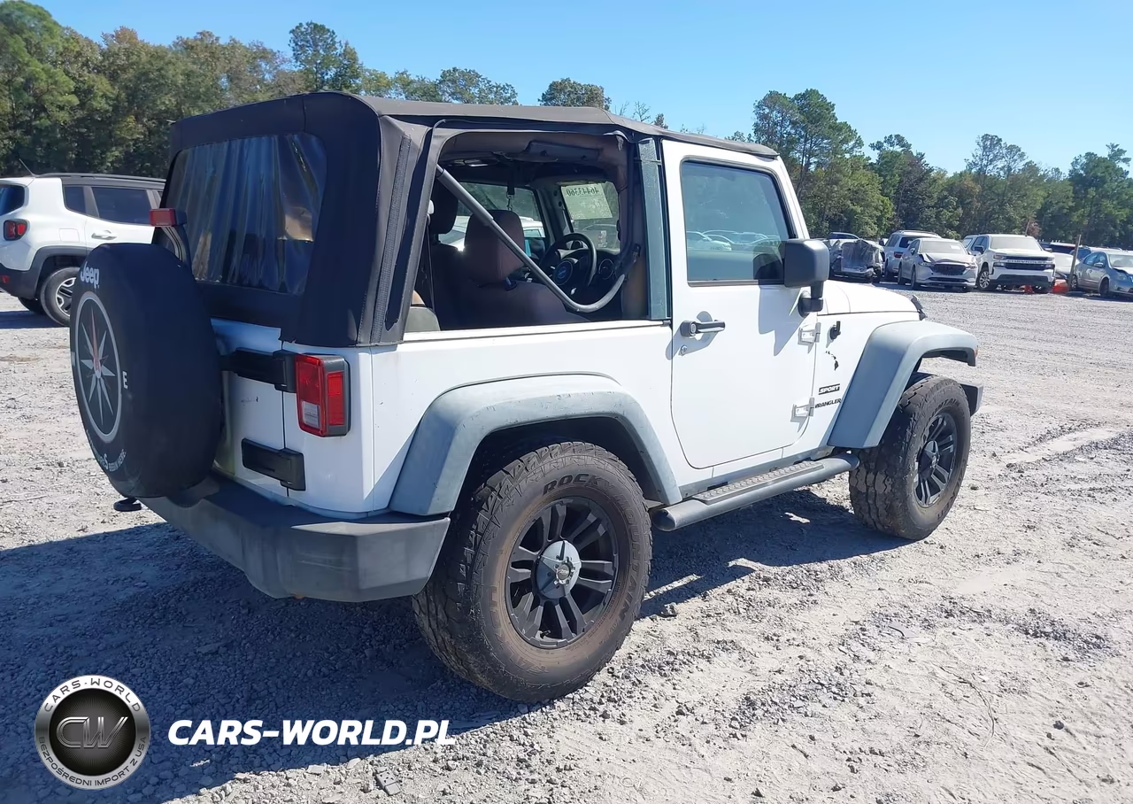 2011 Jeep Wrangler Sport VIN:1J4AA2D13BL536811 - 4