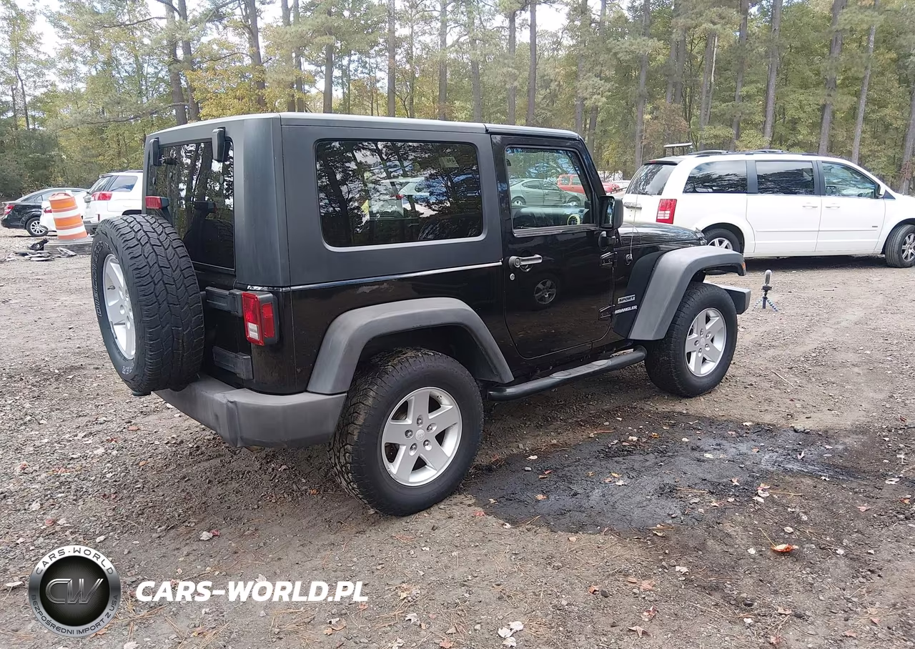 2010 Jeep Wrangler Sport VIN:1J4AA2D10AL118320 - 4