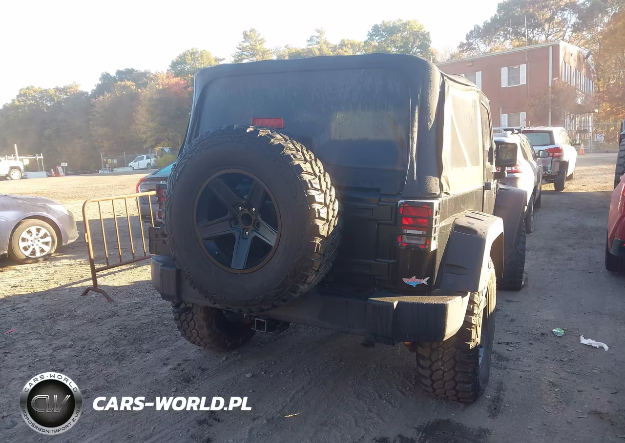 2012 Jeep Wrangler Sport VIN:1C4AJWAG1CL228091 - 4