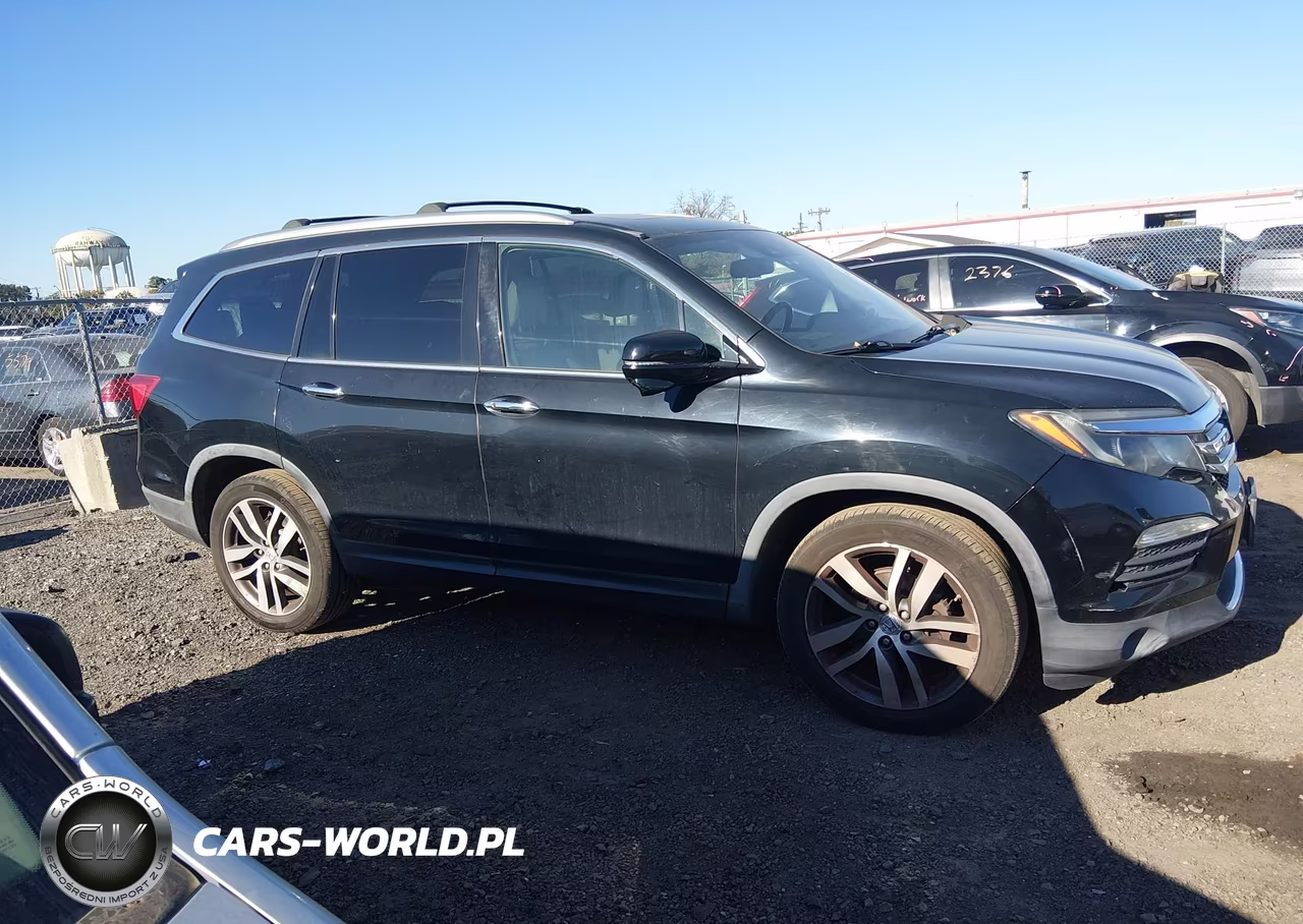 2016 Honda Pilot Touring VIN:5FNYF6H9XGB008240 - 13