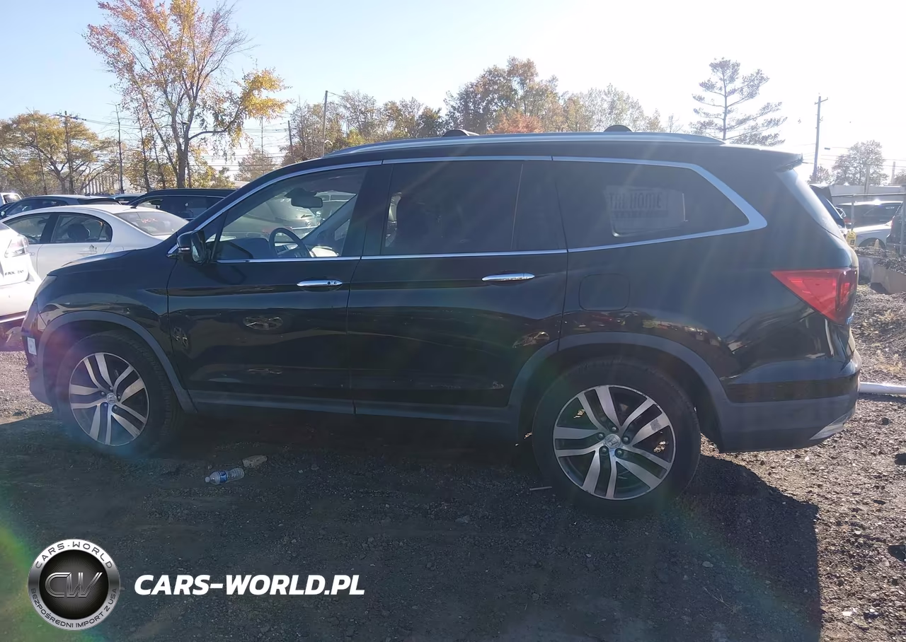 2016 Honda Pilot Touring VIN:5FNYF6H9XGB008240 - 14