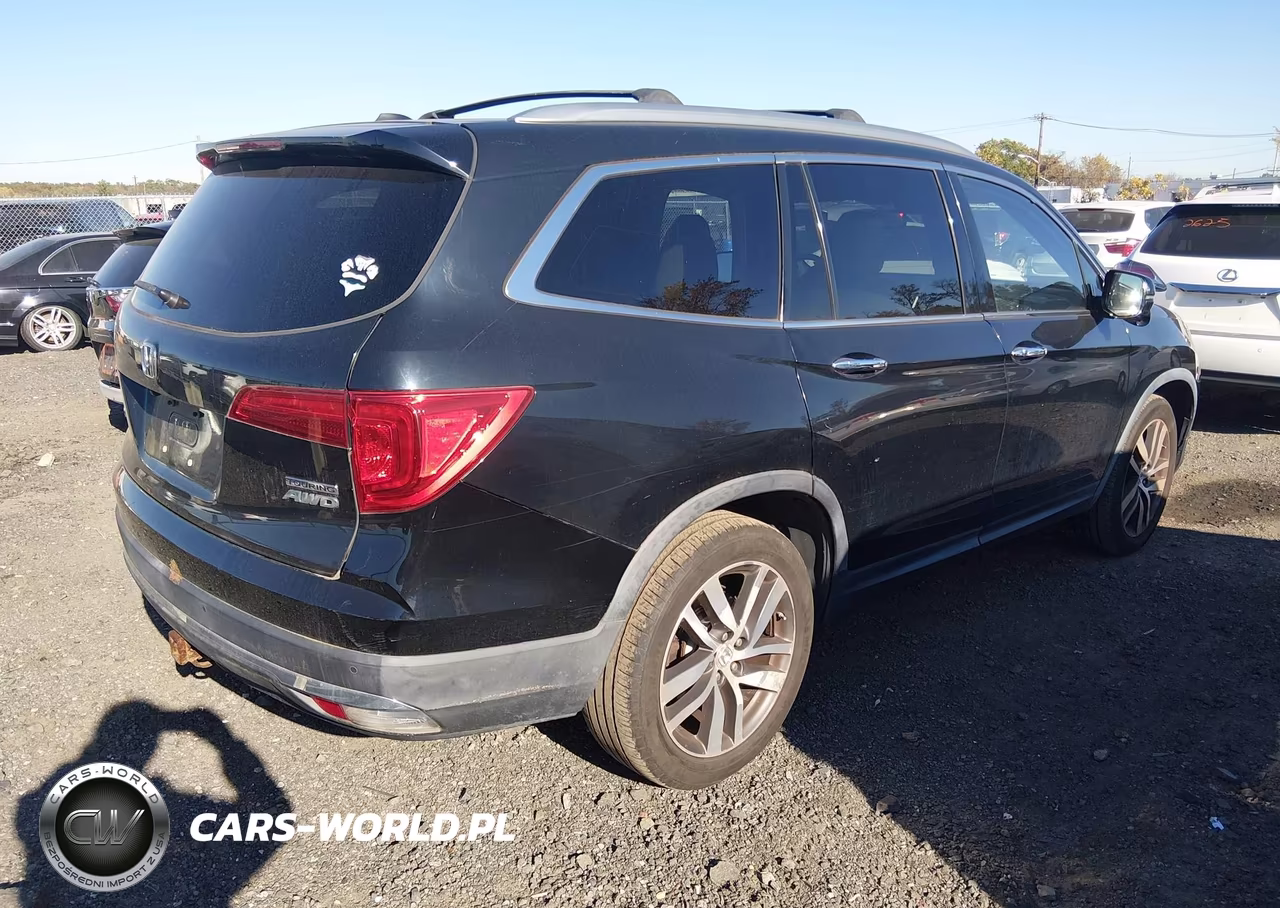 2016 Honda Pilot Touring VIN:5FNYF6H9XGB008240 - 4
