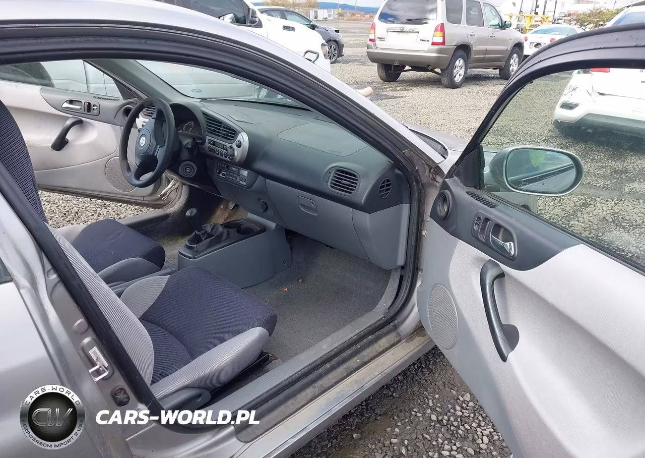 2000 Honda Insight VIN:JHMZE1372YT000999 - 5