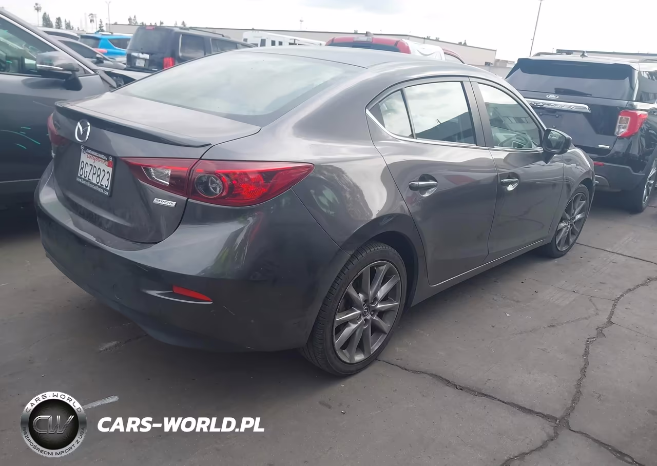 2018 Mazda Mazda3 Touring VIN:3MZBN1V34JM258066 - 4