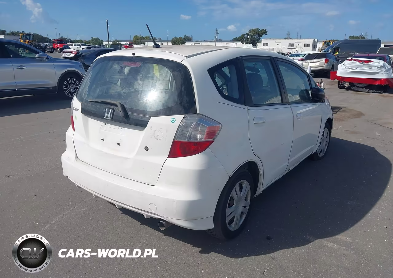 2010 Honda Fit VIN:JHMGE8H2XAC011073 - 4