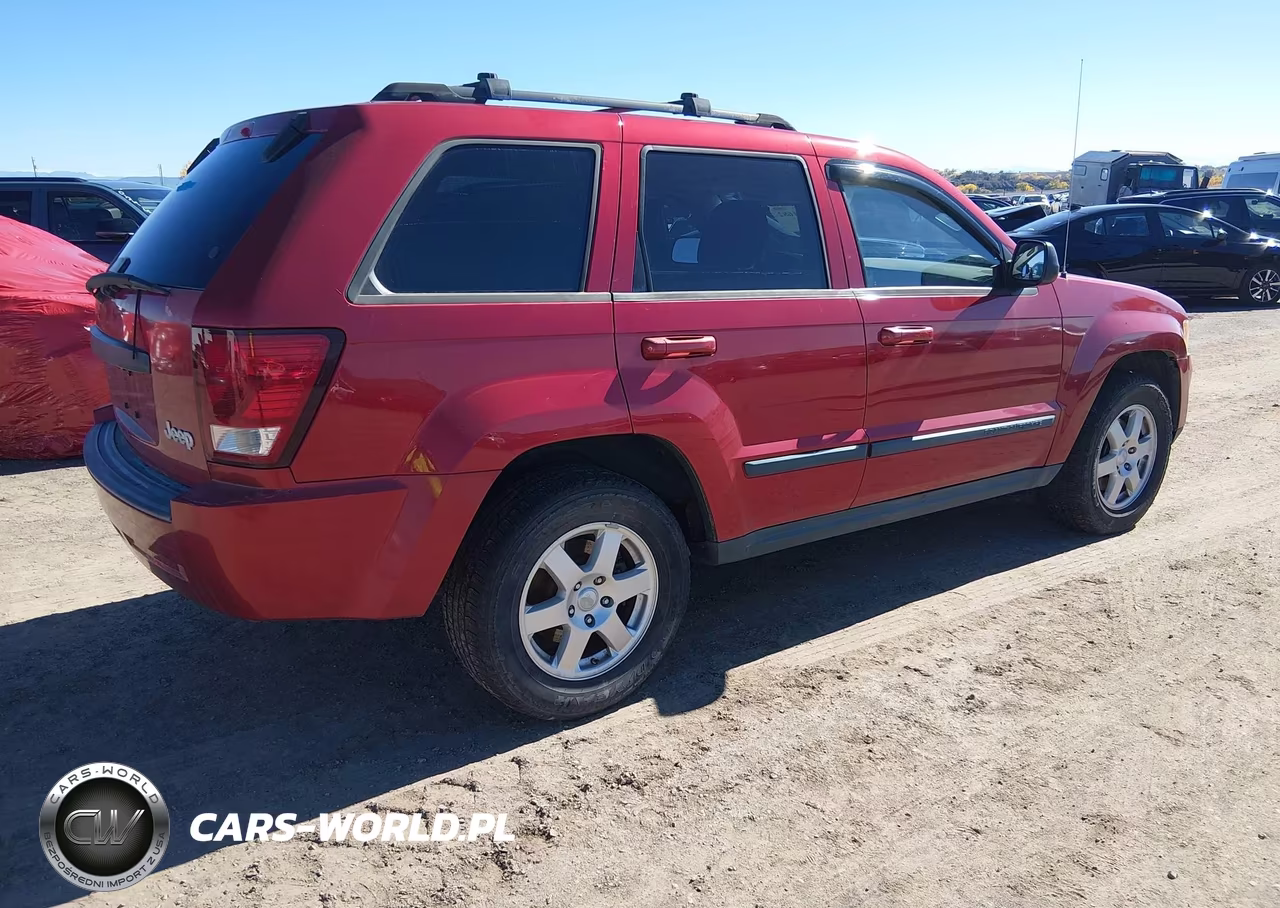 2009 Jeep Grand Cherokee Laredo VIN:1J8GR48K39C553523 - 4
