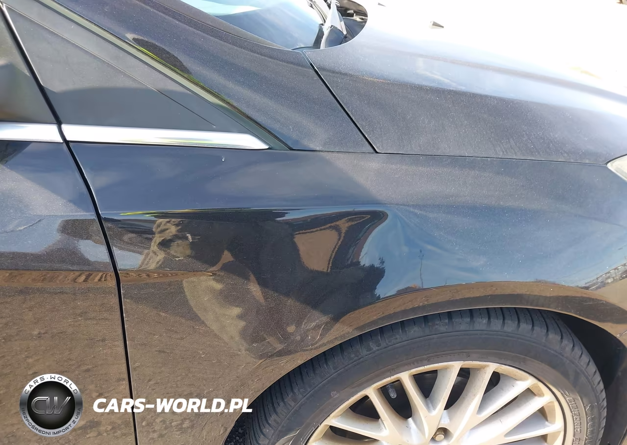 2014 Ford Focus Titanium VIN:1FADP3J26EL106169 - 13