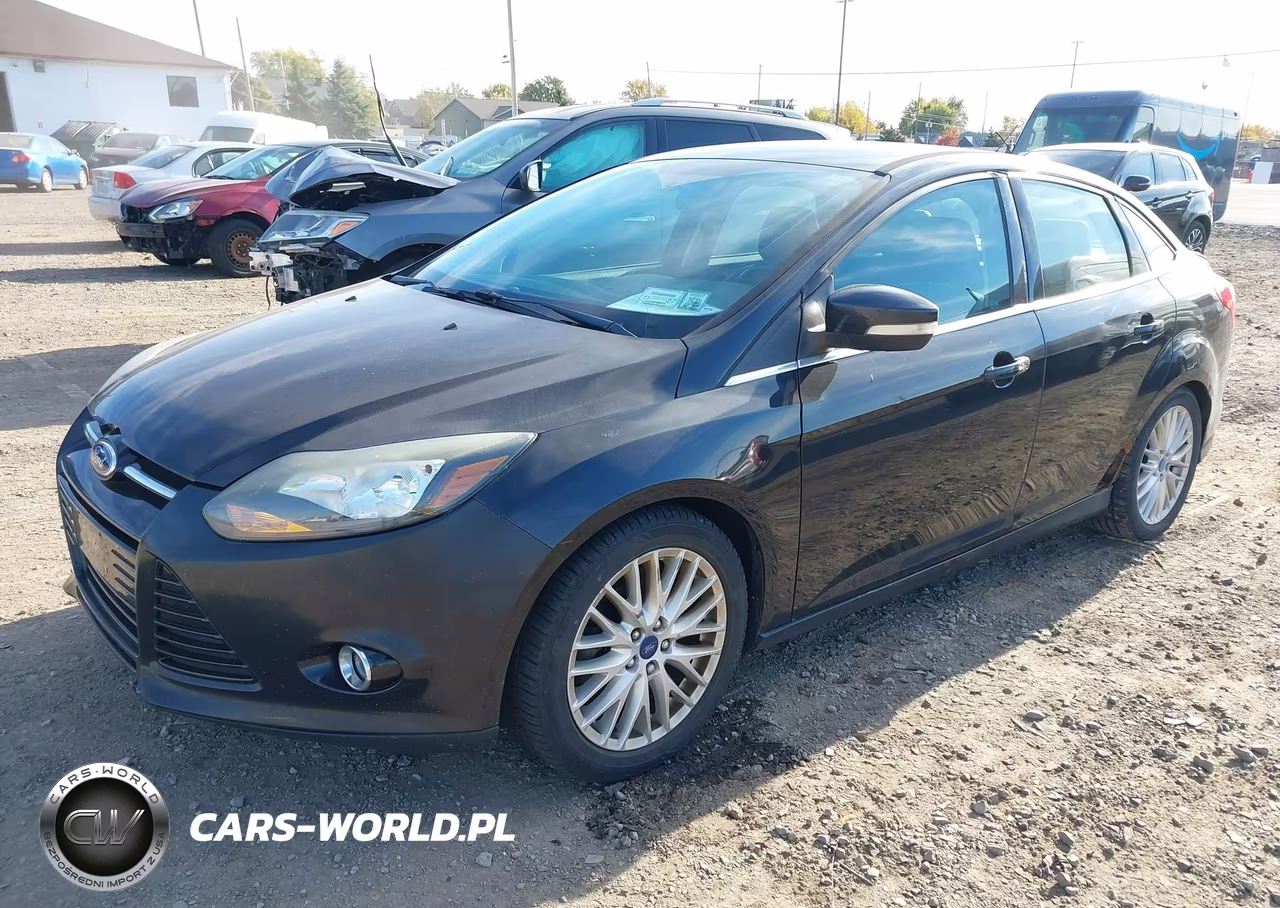 2014 Ford Focus Titanium VIN:1FADP3J26EL106169 - 2