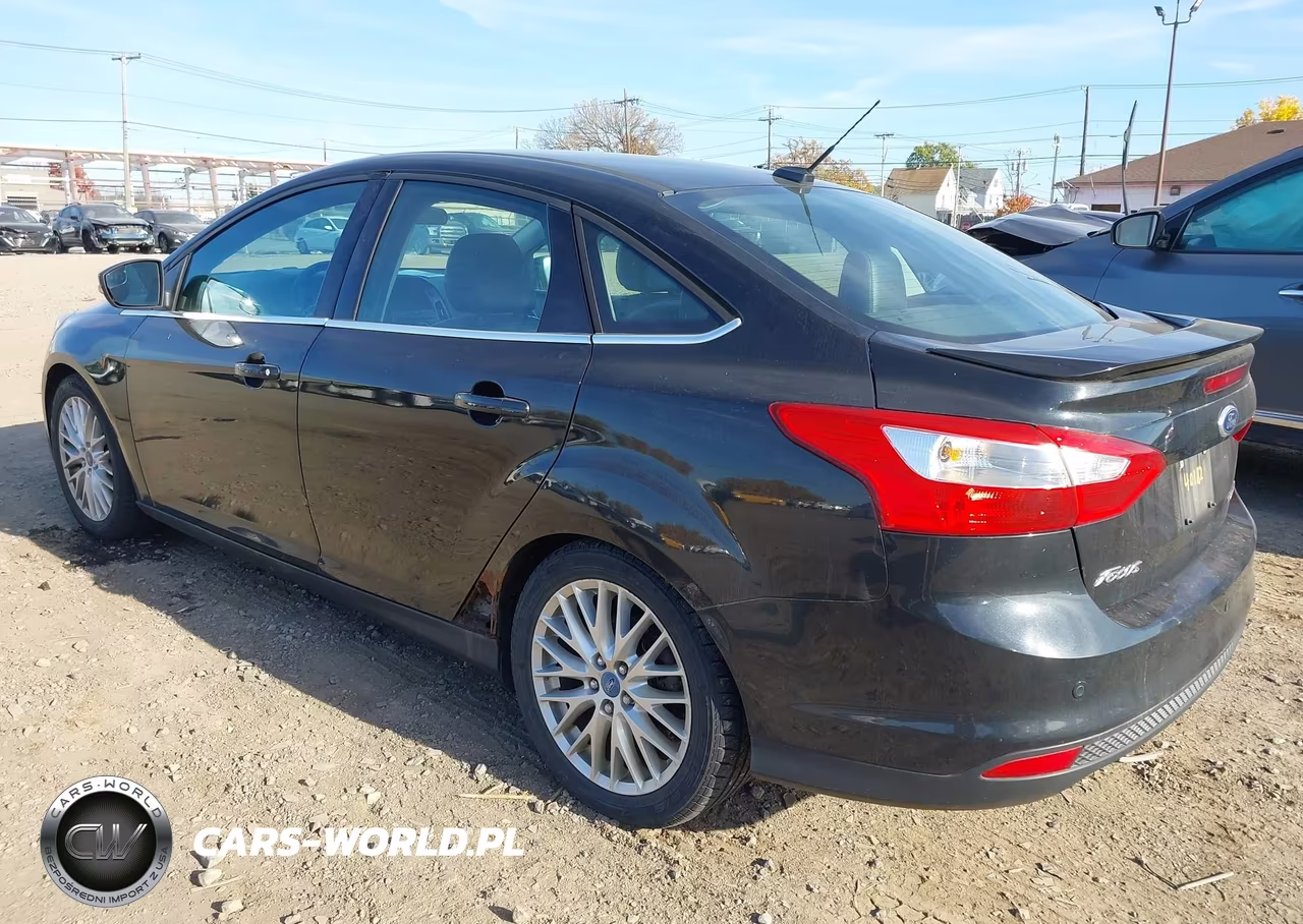 2014 Ford Focus Titanium VIN:1FADP3J26EL106169 - 3