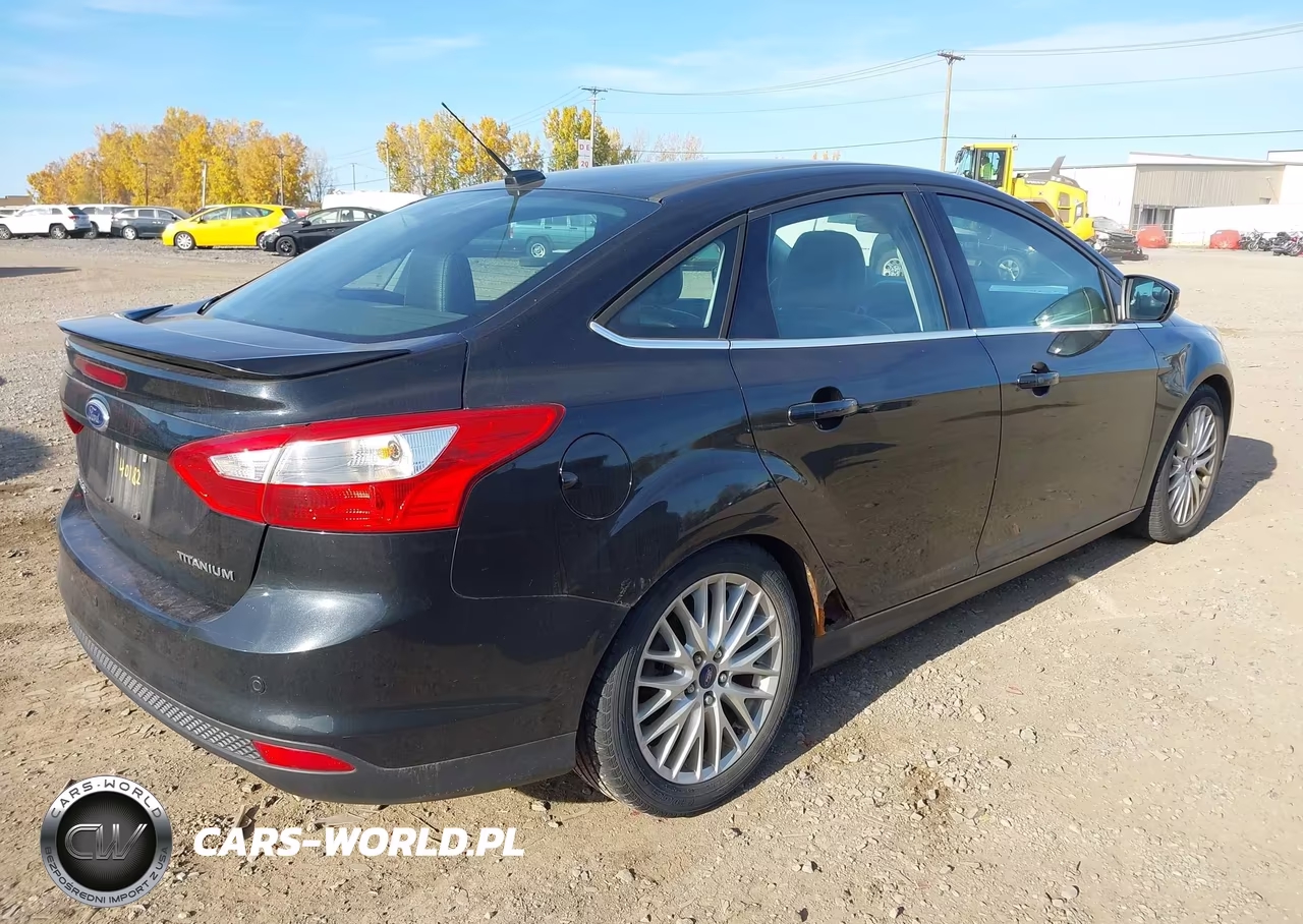 2014 Ford Focus Titanium VIN:1FADP3J26EL106169 - 4