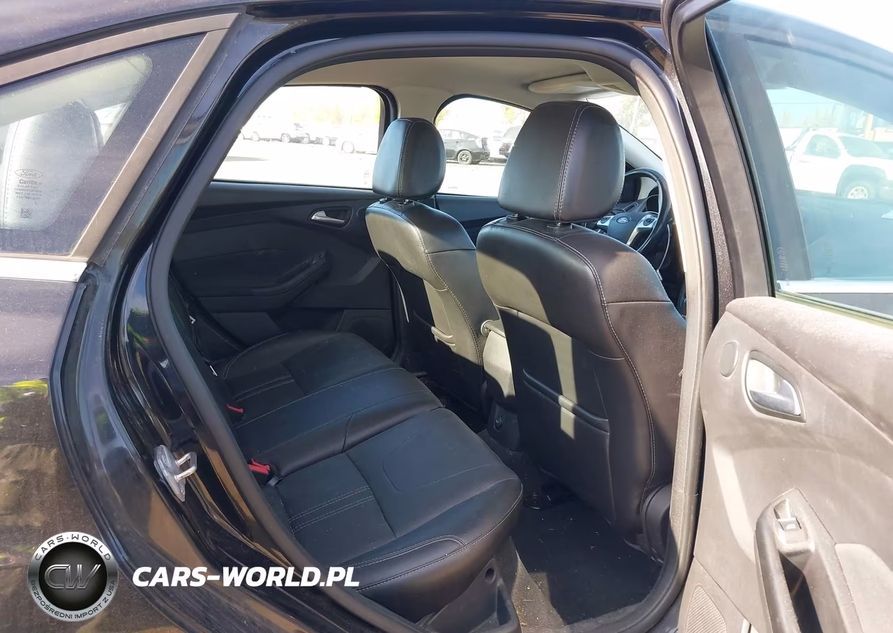 2014 Ford Focus Titanium VIN:1FADP3J26EL106169 - 8