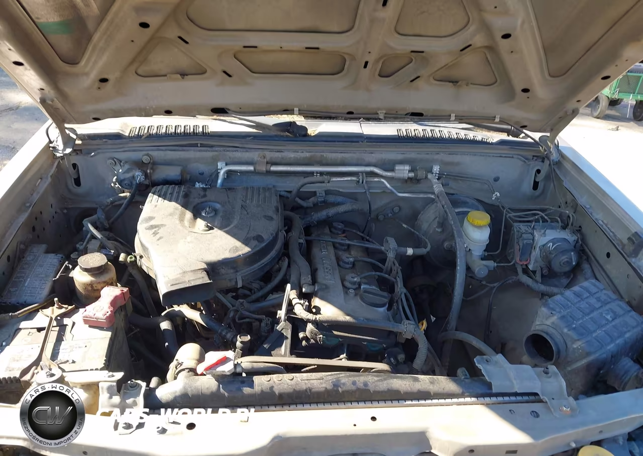 2004 Nissan Frontier Xe VIN:1N6DD26T04C402301 - 10