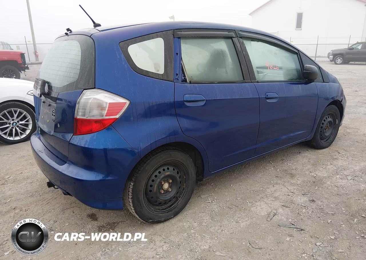 2009 Honda Fit VIN:JHMGE88269S051913 - 4