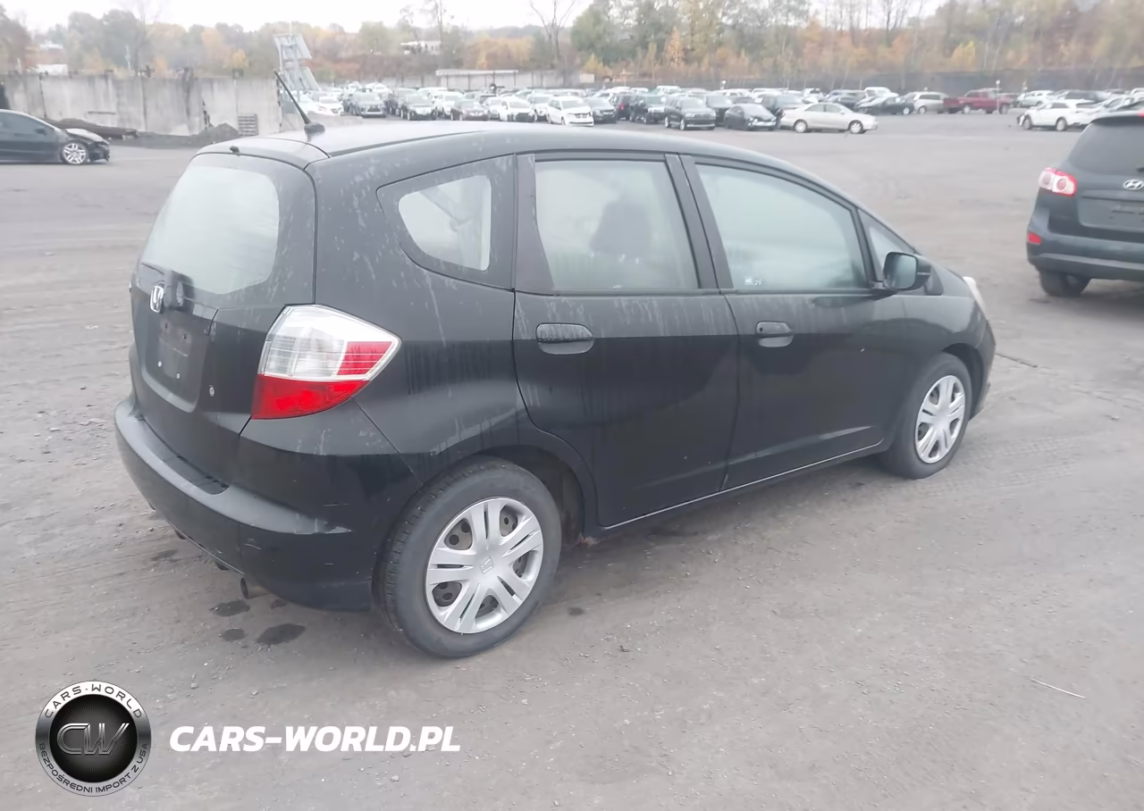 2009 Honda Fit VIN:JHMGE87219S038584 - 4
