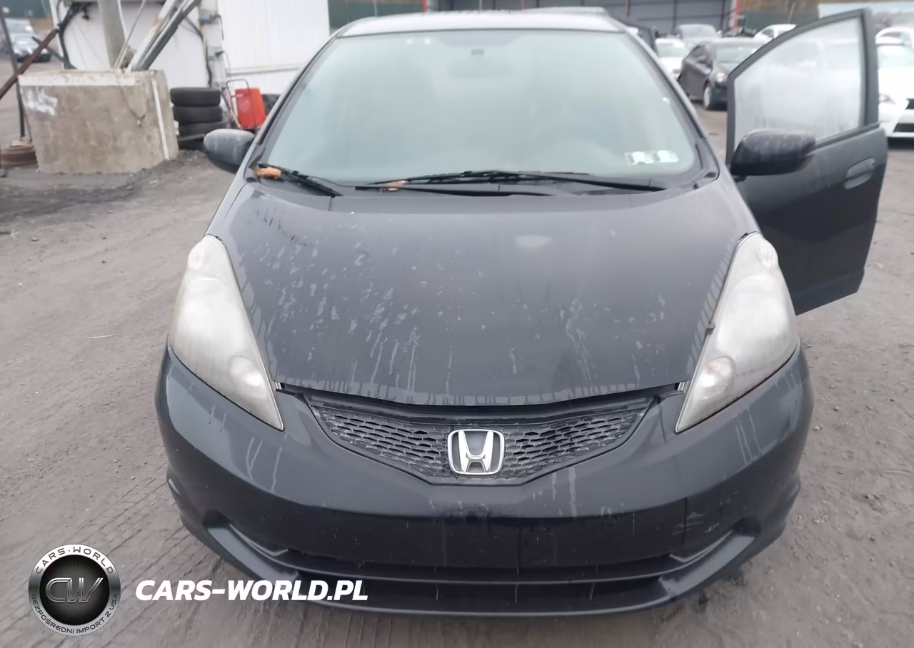 2009 Honda Fit VIN:JHMGE87219S038584 - 6